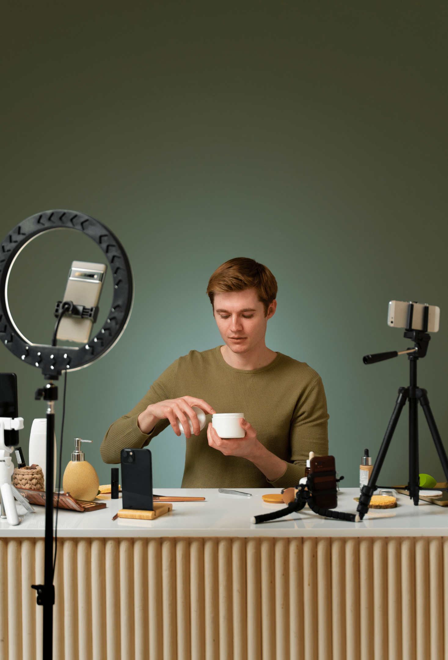 An image showing a person filming a product demonstration video, which is a great example of what video marketing content should i make for my company.
