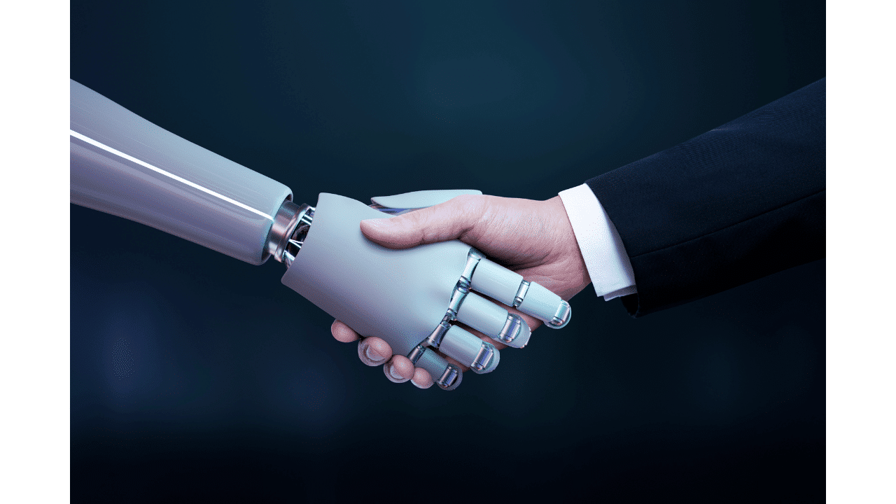 robotic arm and human arm shaking hands