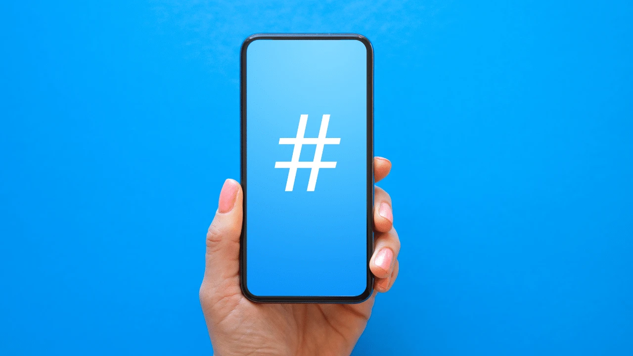 A person utilizing twitter, hashtags, trending topics
