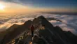 Original clip, frame 1: sunrise over the clouds beside a mountain ridge