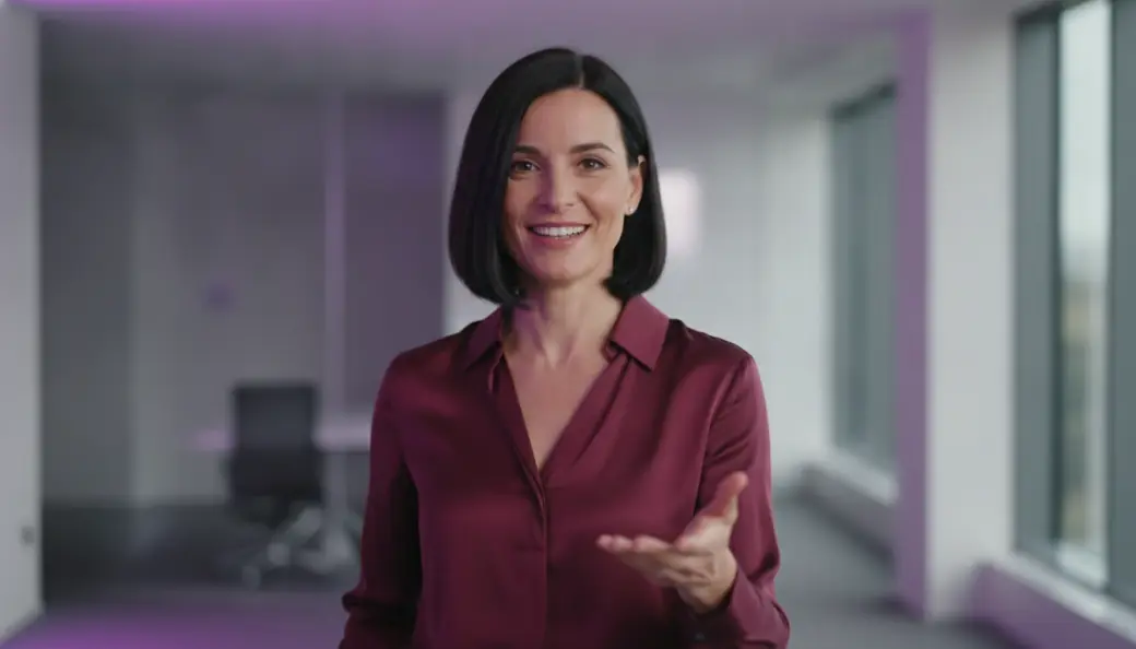 A presenter explaining a quarterly review in a captioned video Pictory made from a PowerPoint
