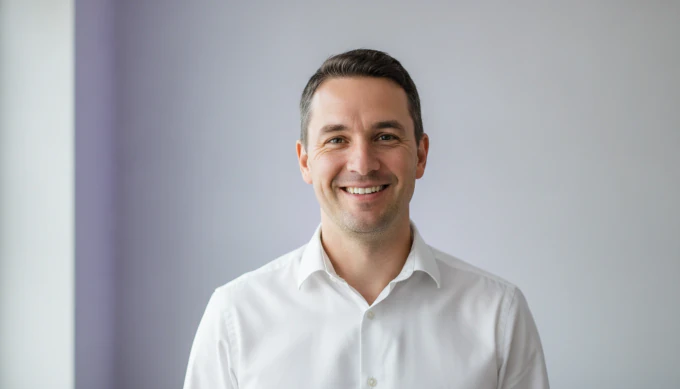 A recruiter in a bright office in a LinkedIn video about an open role