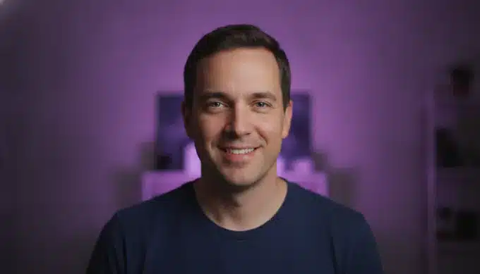 A science creator in his home studio in a 16:9 explainer video for his channel
