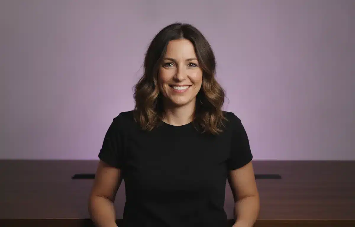 A video producer at her editing desk after transcribing an interview with Pictory